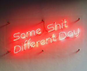 Text: Same shit different day